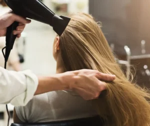 Why Your Hair Dryer Pulls in Your Hair & How to Stop it