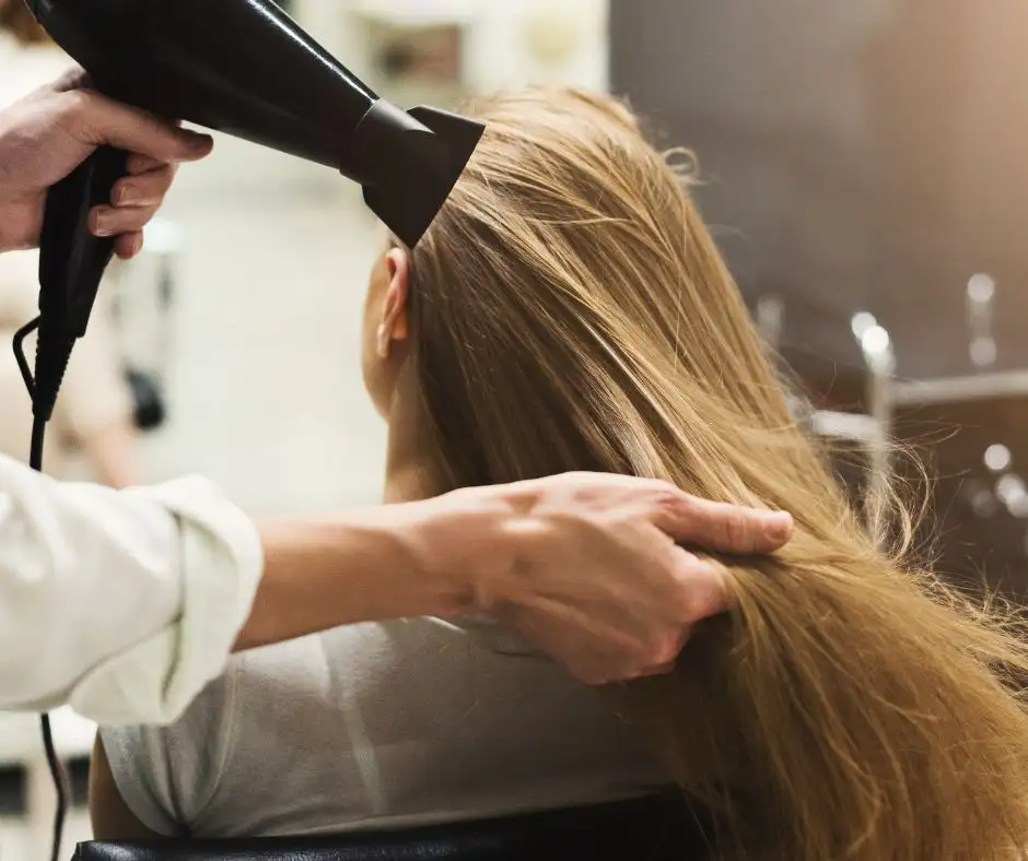 Why Your Hair Dryer Pulls in Your Hair & How to Stop it